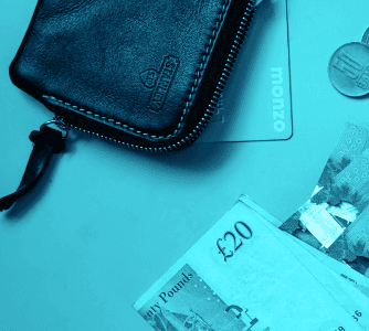Wallet and money on blue background